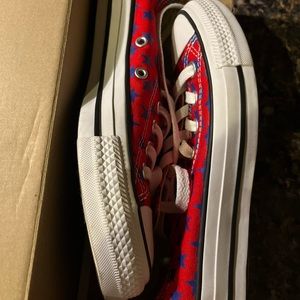 Red converse with blue stars brand new only wore twice.